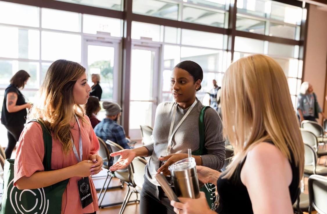 Conference attendees networking and connecting during a professional event